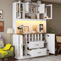 Sideboard mit LED Beleuchtung und goldfarbenen Griffen